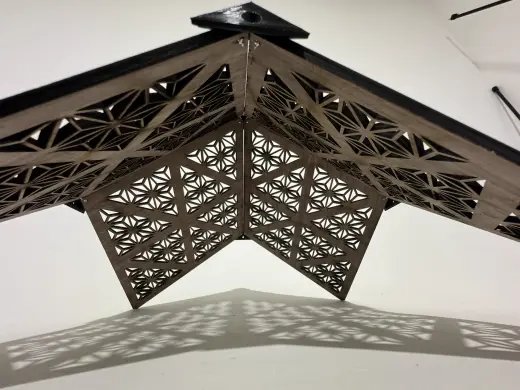 Laser-cut rhombic dodecahedron lamp 11